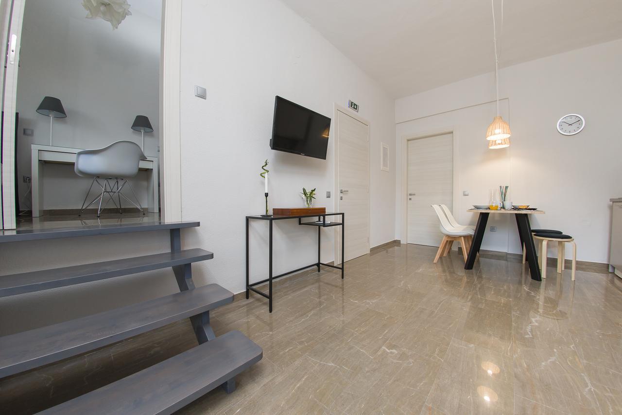 Palio Grey Apartments Palaiontsiflikion Bagian luar foto