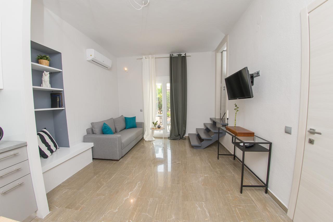 Palio Grey Apartments Palaiontsiflikion Bagian luar foto